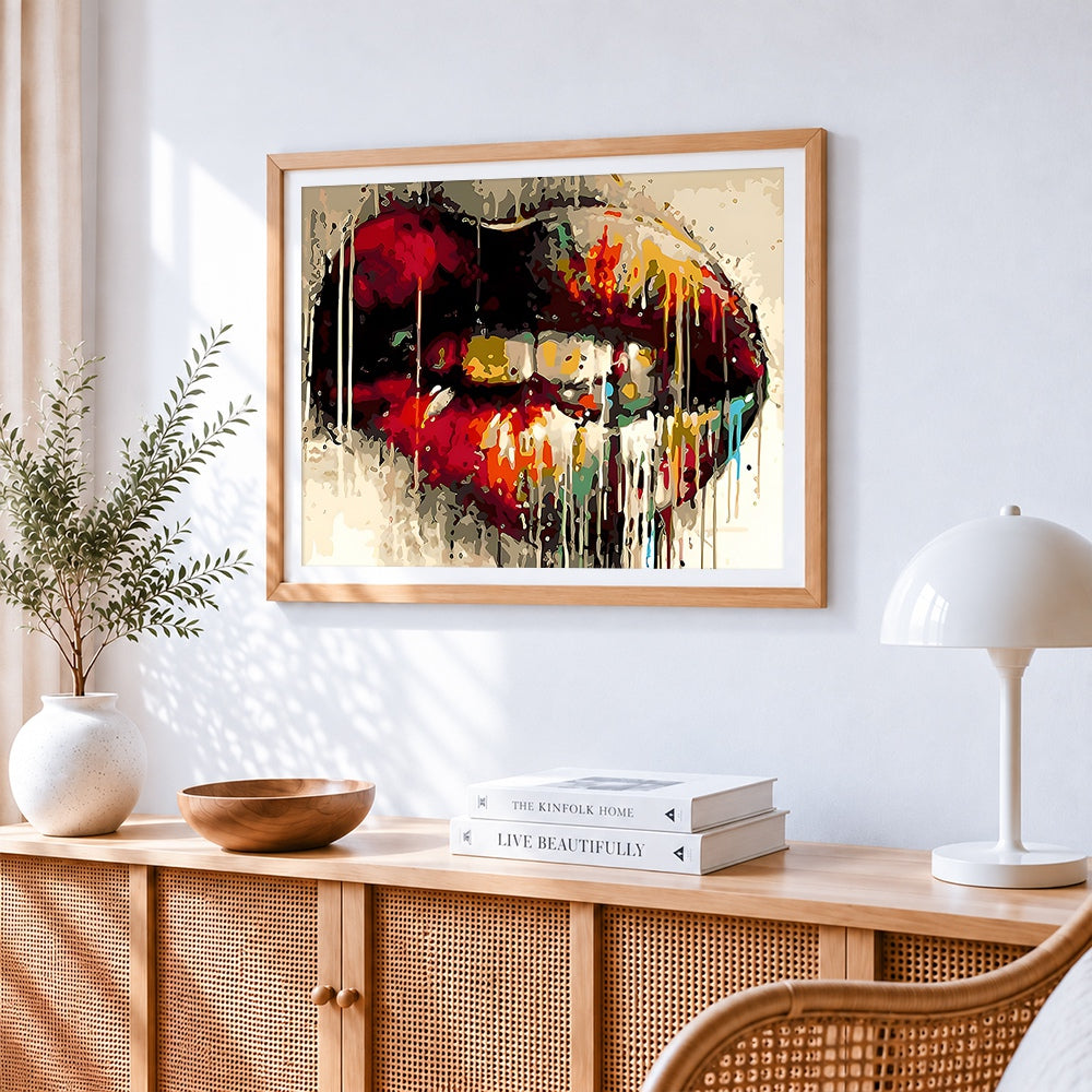 Graffiti red lips cross stitch artwork displayed on wall as home decor