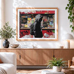 Finished graffiti style hooded boy cross stitch artwork displayed