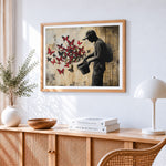 Graffiti style man with butterflies cross stitch artwork displayed on wall as home decor