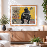 Finished graffiti-style seated man paint by numbers artwork displayed as home decor