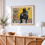 Graffiti-style seated man paint by numbers artwork displayed on wall as home decor