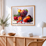 Grapes and peaches cross stitch artwork displayed on wall as home decor