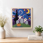Finished graveyard ghosts night scene artwork displayed on a wall