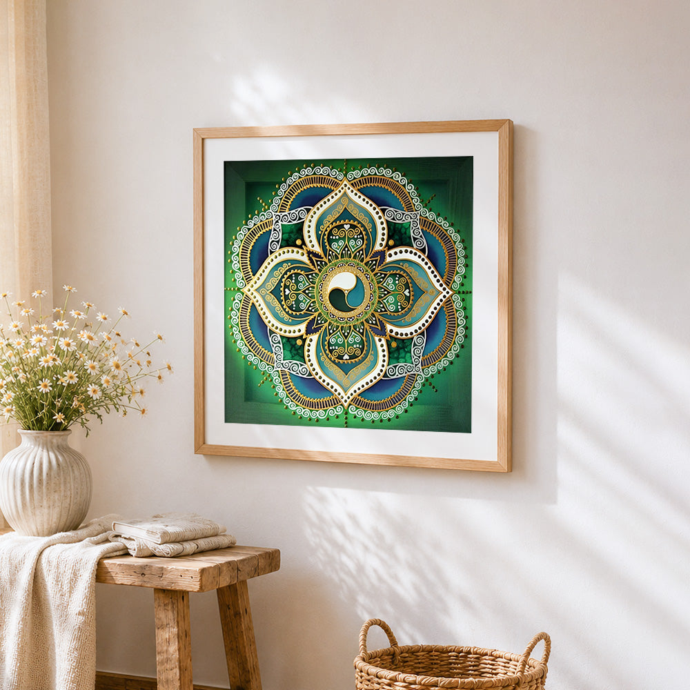 Green and gold geometric mandala cross stitch artwork displayed on wall as home decor
