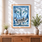 Finished green eyed wolf pack cross stitch artwork displayed