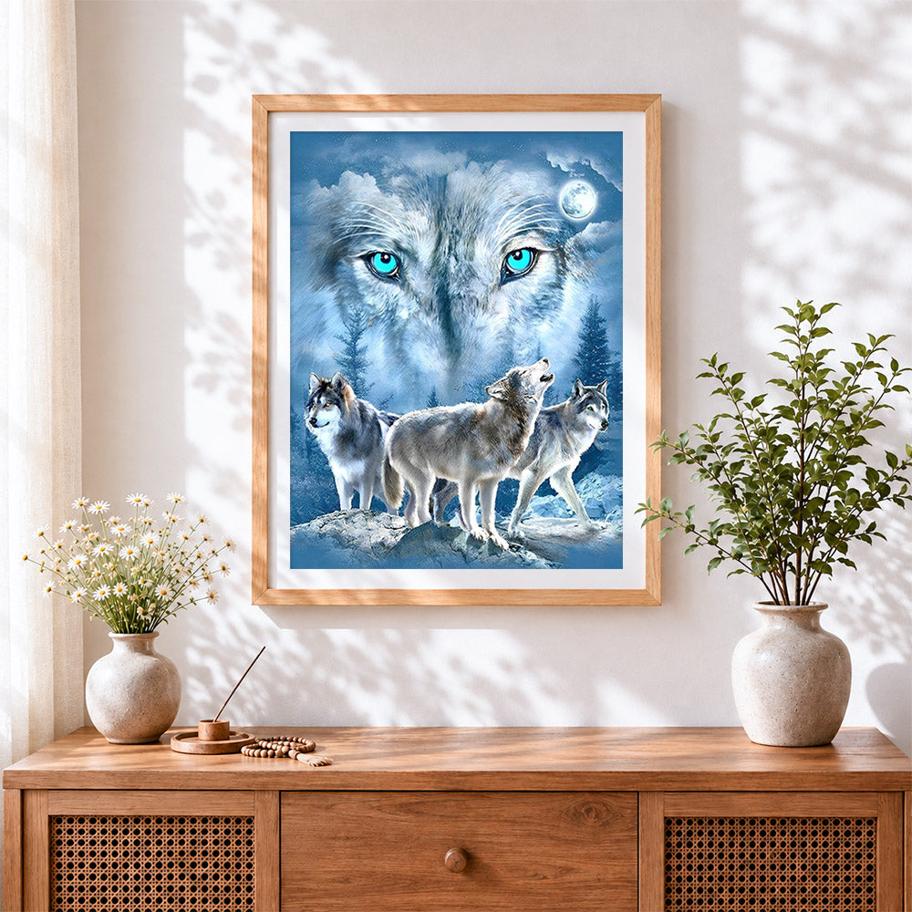 Finished green eyed wolf pack cross stitch artwork displayed