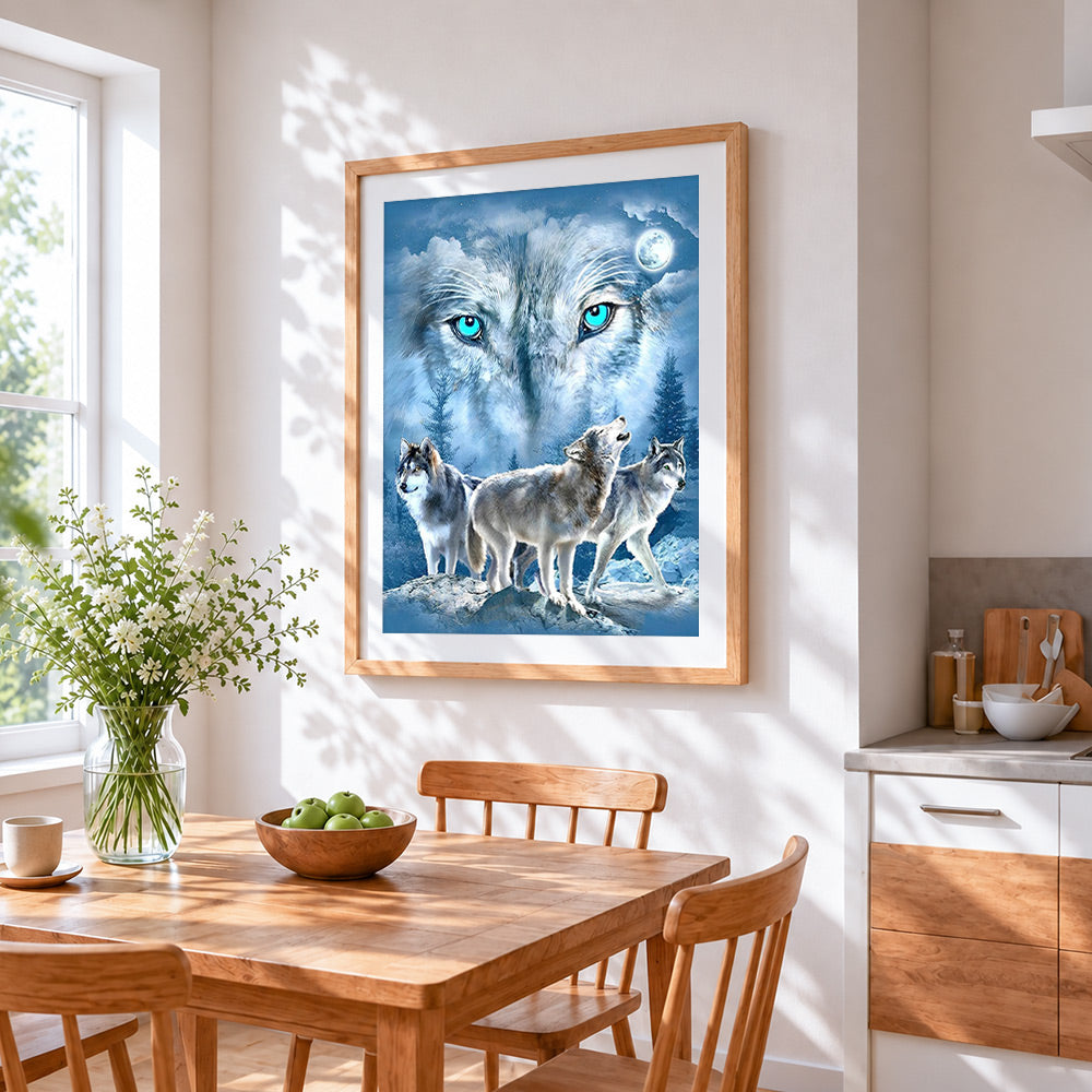 Green eyed wolf pack cross stitch artwork displayed on wall as home decor
