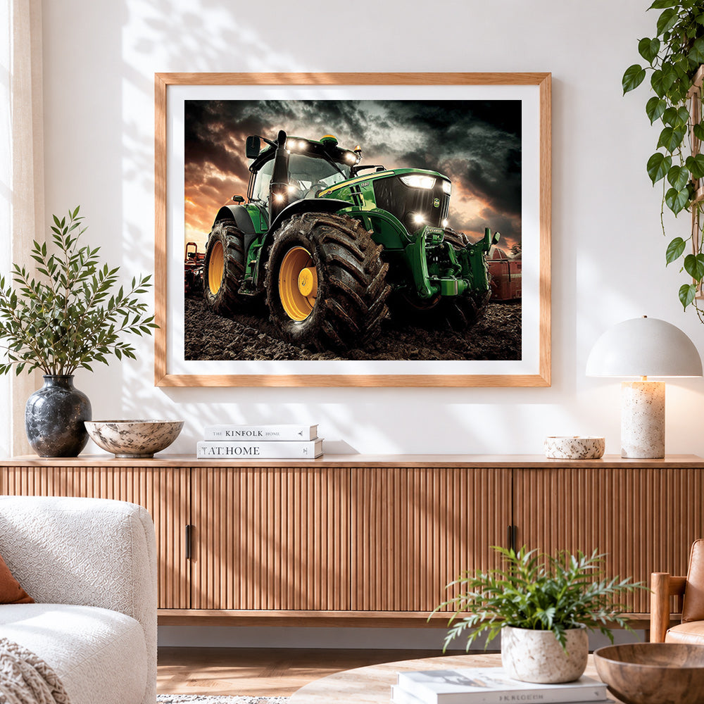 Finished green tractor in stormy field cross stitch artwork displayed
