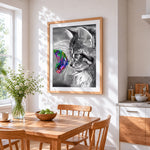 Grey cat with a colourful butterfly cross stitch artwork displayed on wall as home decor