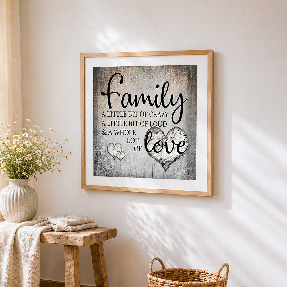 Grey texture family quote cross stitch artwork displayed on wall as home decor