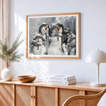 Group of snowmen in winter hats cross stitch artwork displayed on wall as home decor