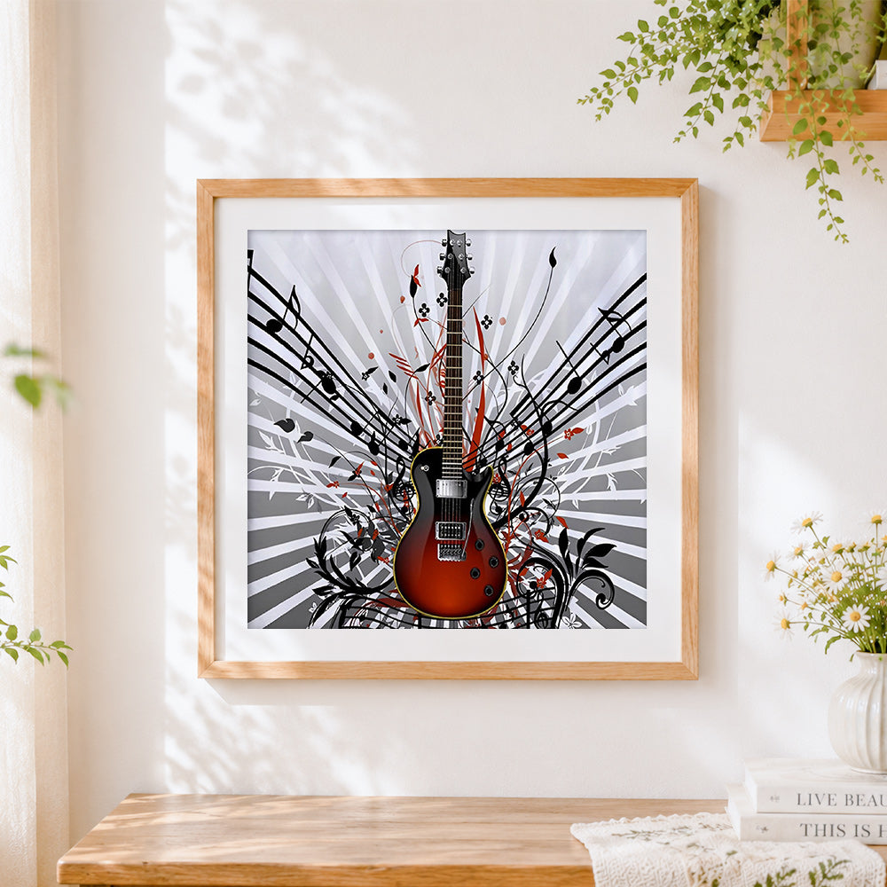 Finished guitar with music notes and vines cross stitch artwork displayed