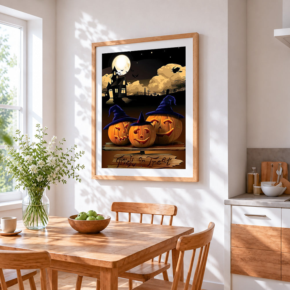 Halloween jack-o'-lanterns and haunted house cross stitch artwork displayed on wall as home decor