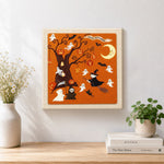 Finished halloween spooky tree artwork displayed on a wall