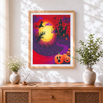 Finished halloween witch castle with full moon cross stitch artwork displayed