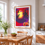 Halloween witch castle with full moon cross stitch artwork displayed on wall as home decor