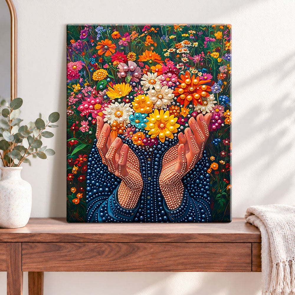 Finished hands full of blooms pearl diamond painting artwork displayed as home decor