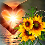 Hands making a heart with sunflowers cross stitch kit for beginners