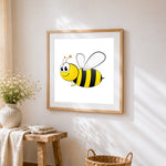 Happy cartoon bee cross stitch artwork displayed on wall as home decor