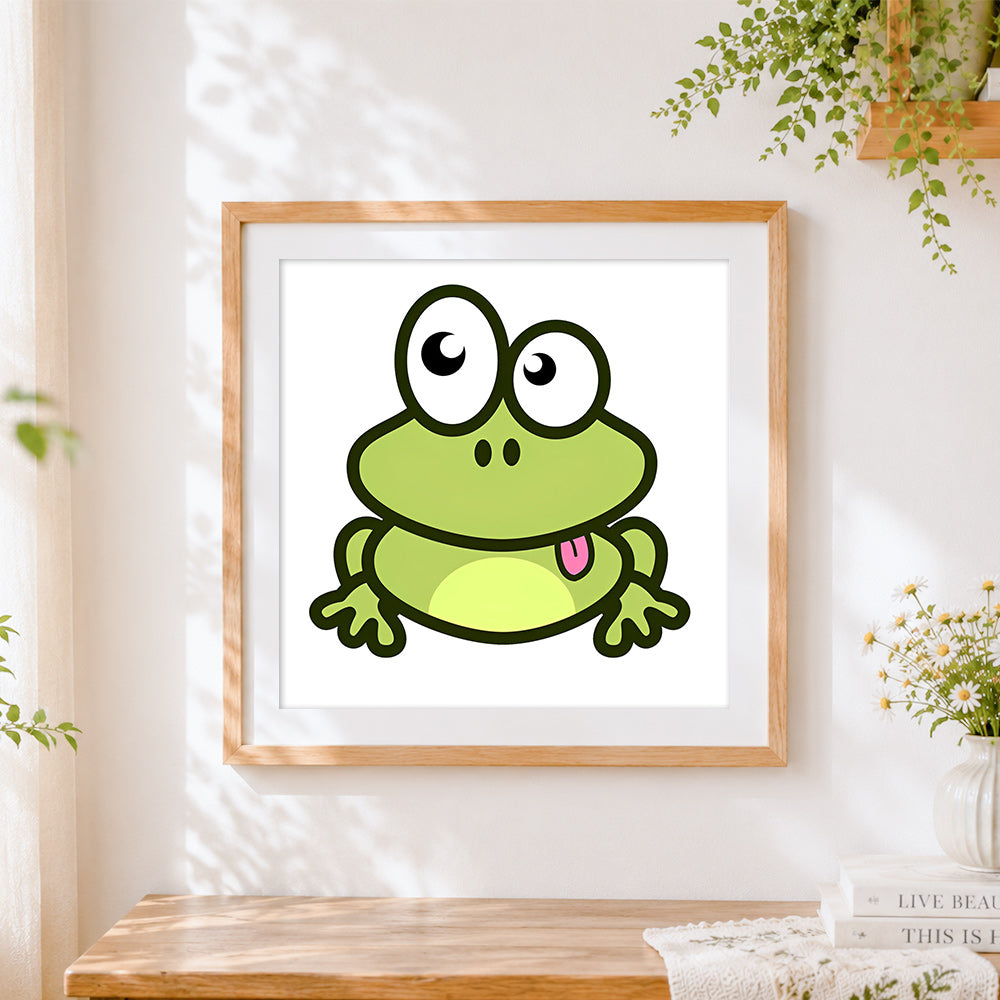 Finished happy cartoon frog cross stitch artwork displayed