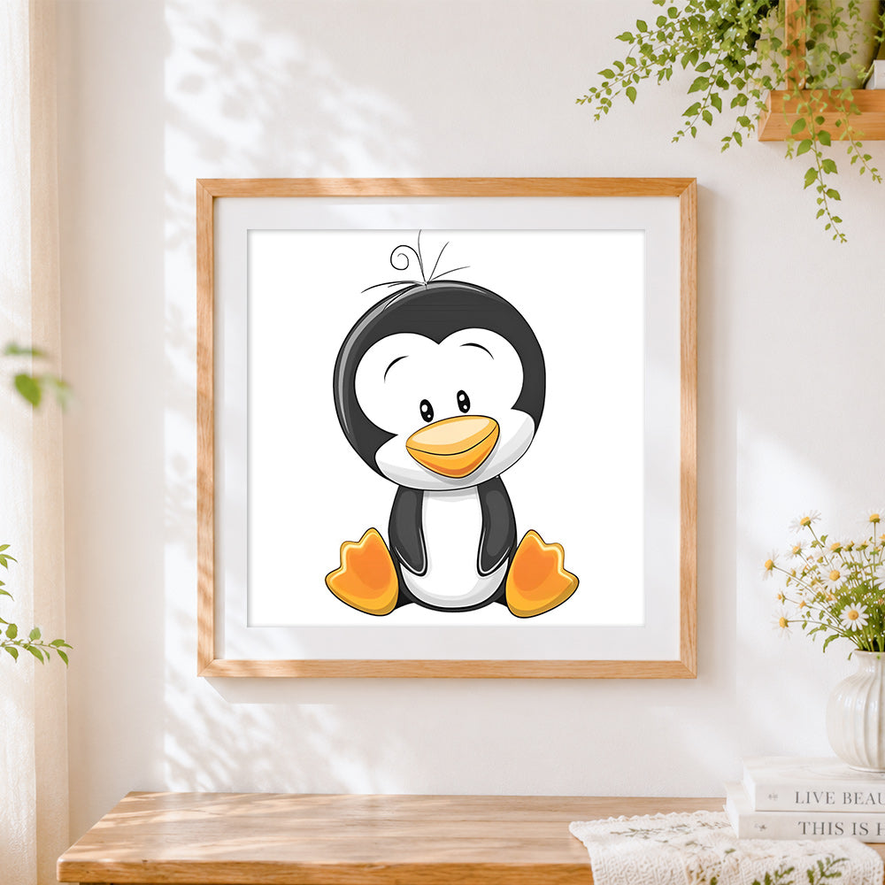 Finished happy cartoon penguin cross stitch artwork displayed