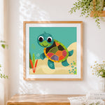 Finished happy cartoon sea turtle cross stitch artwork displayed