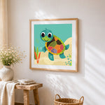 Happy cartoon sea turtle cross stitch artwork displayed on wall as home decor