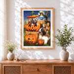 Finished happy cats, dogs and halloween pumpkins cross stitch artwork displayed