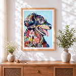 Finished happy dog surrounded by flowers cross stitch artwork displayed