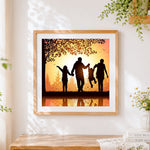 Finished happy family at sunset cross stitch artwork displayed