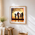 Happy family at sunset cross stitch artwork displayed on wall as home decor