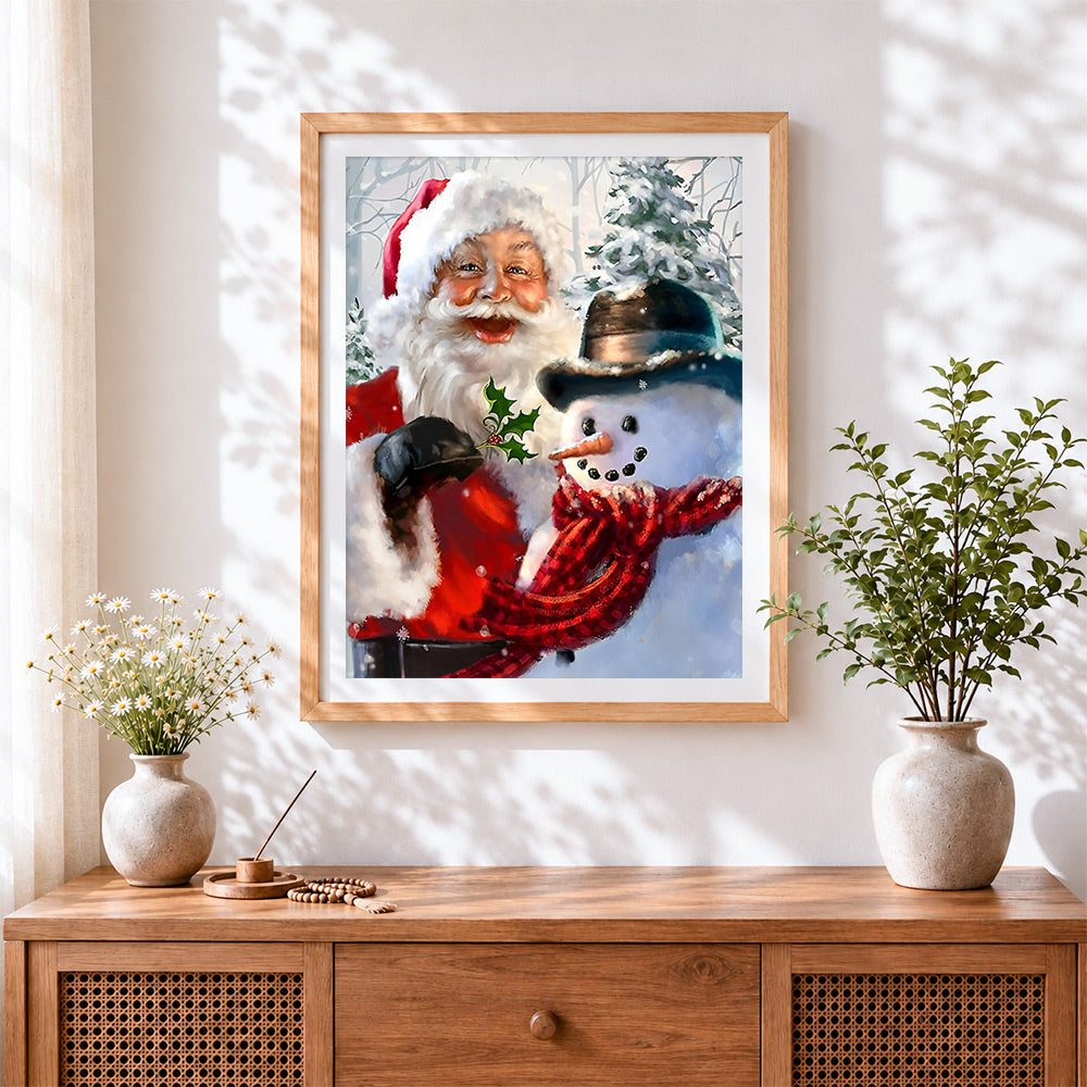 Finished happy father christmas and snowman cross stitch artwork displayed