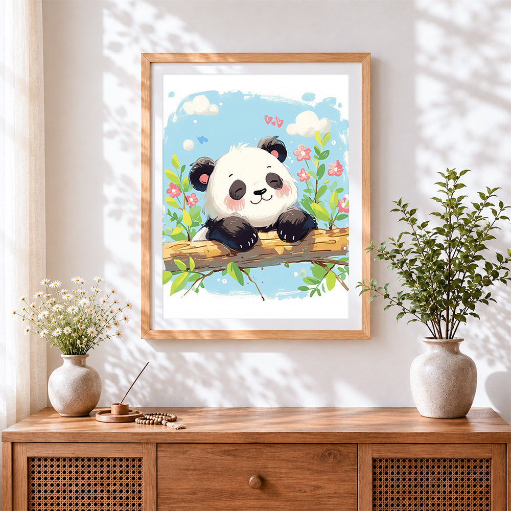 Finished happy panda on a branch cross stitch artwork displayed