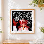 Finished happy snowman with red hat cross stitch artwork displayed