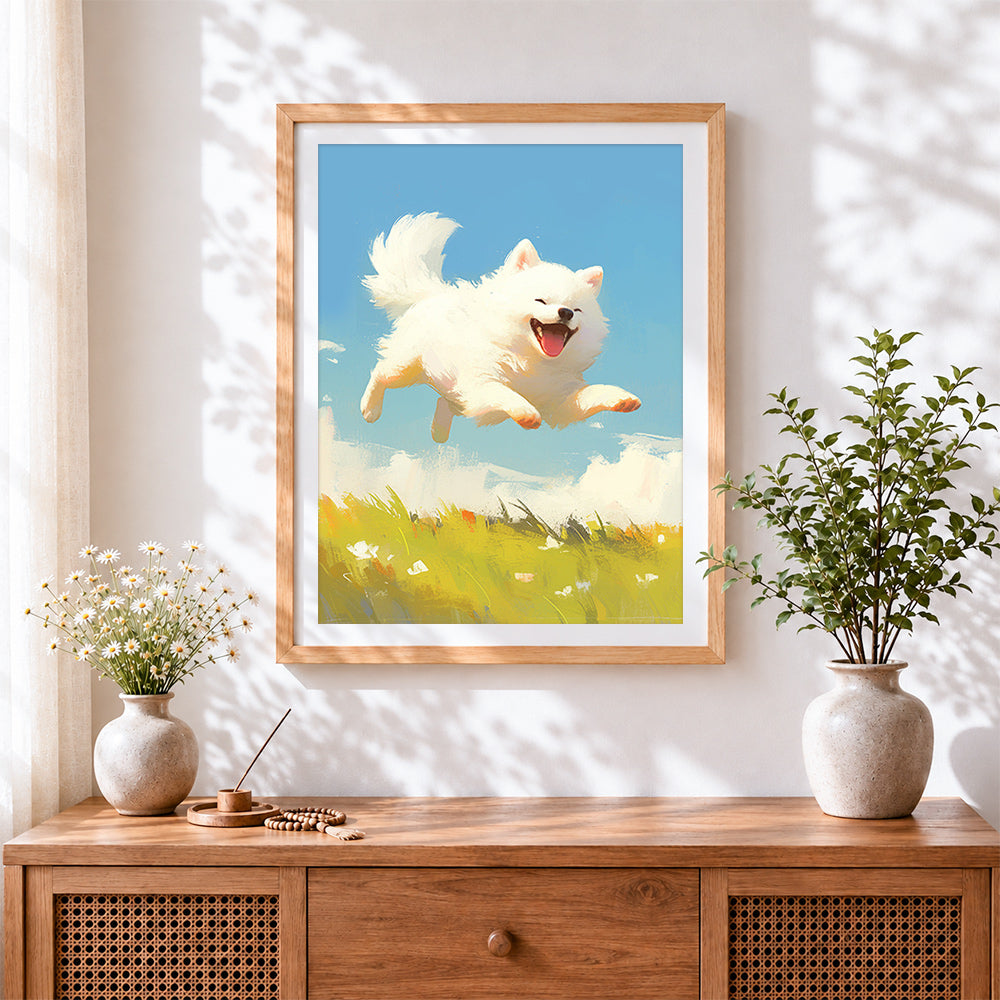 Finished happy white pomeranian jumping cross stitch artwork displayed