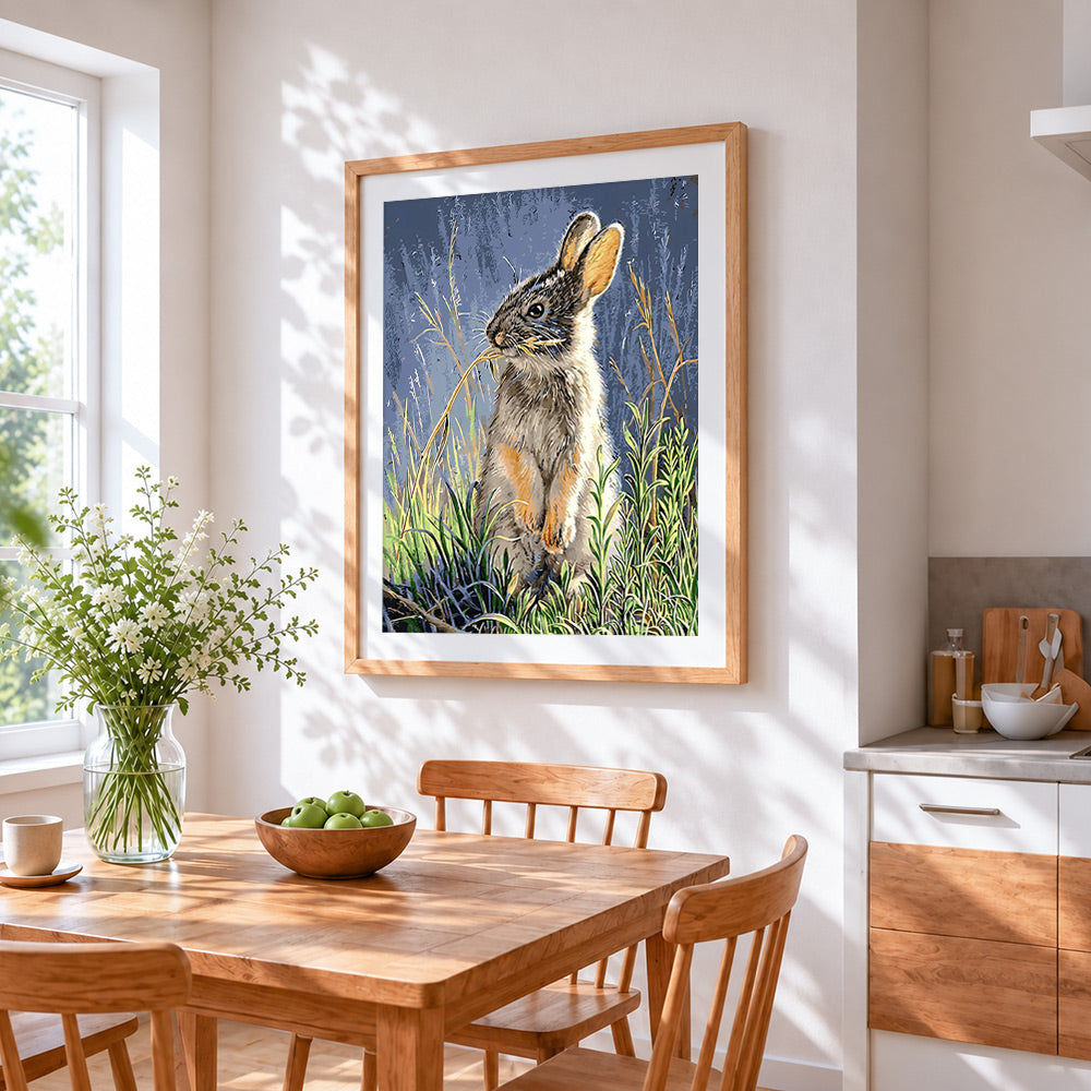 Hare in grass cross stitch artwork displayed on wall as home decor