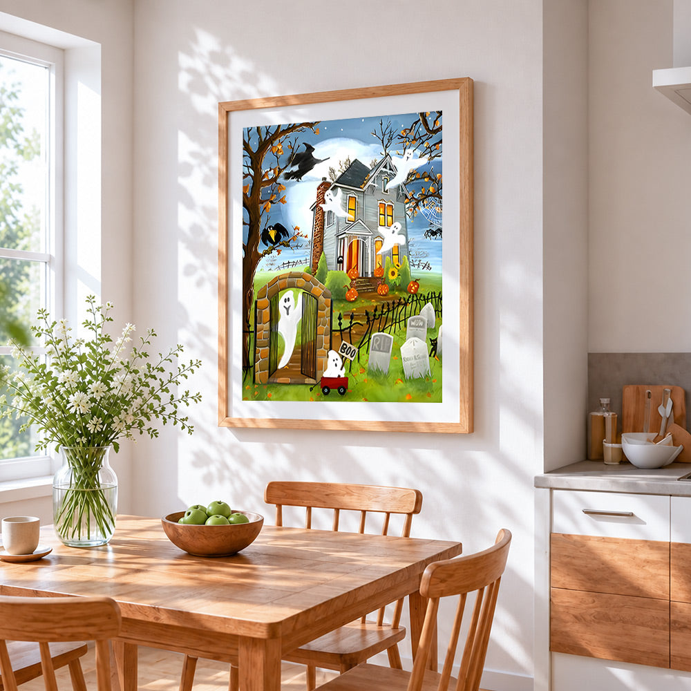 Haunted house with ghosts and graveyard cross stitch artwork displayed on wall as home decor