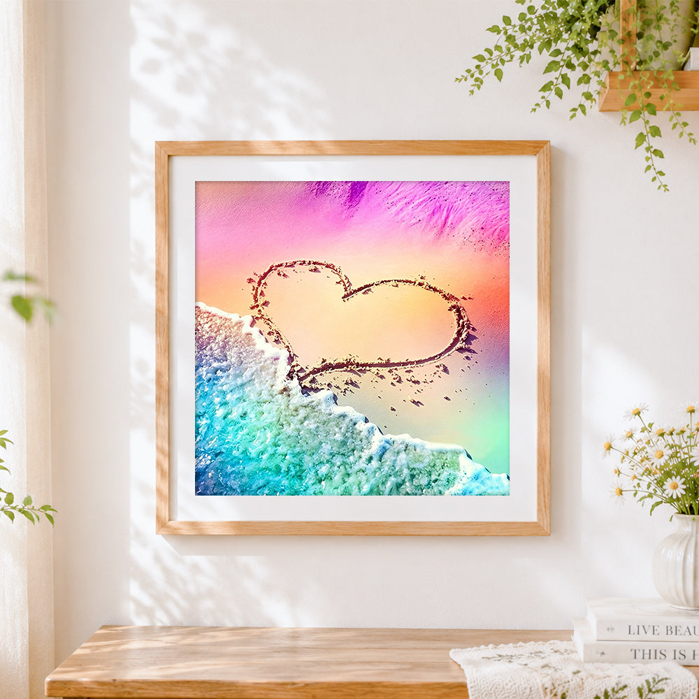 Finished heart drawn in sand with ocean waves paint by numbers artwork displayed as home decor