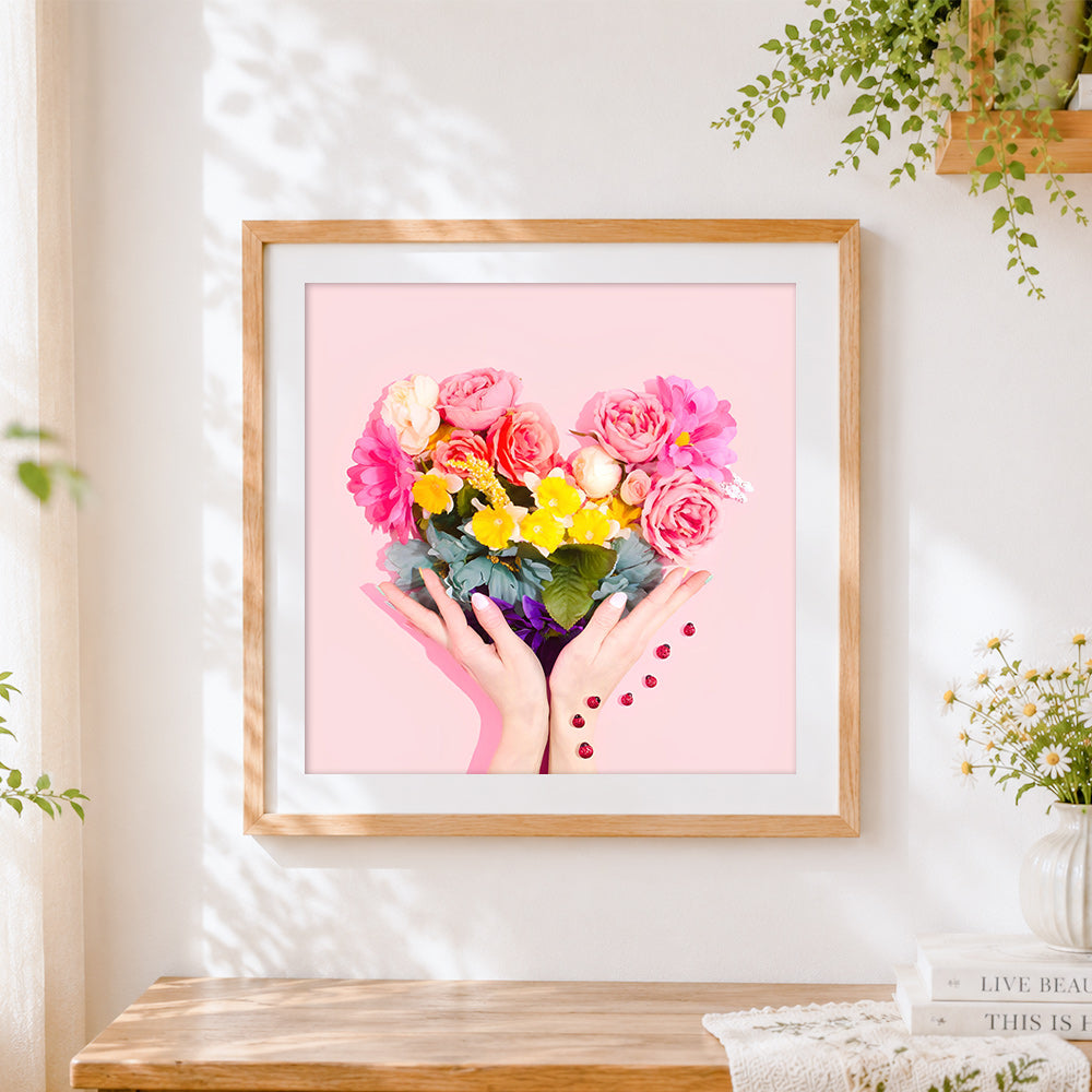 Finished heart-shaped flower bouquet in hands paint by numbers artwork displayed as home decor