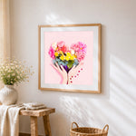 Heart-shaped flower bouquet in hands paint by numbers artwork displayed on wall as home decor
