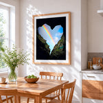 Heart shaped rainbow in the rocks paint by numbers artwork displayed on wall as home decor