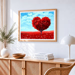 Heart-shaped red tree cross stitch artwork displayed on wall as home decor