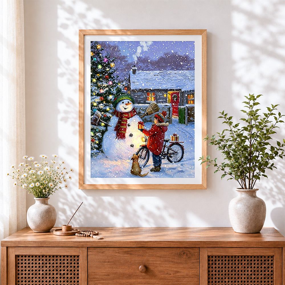 Finished heartwarming boy giving a gift to a snowman cross stitch artwork displayed