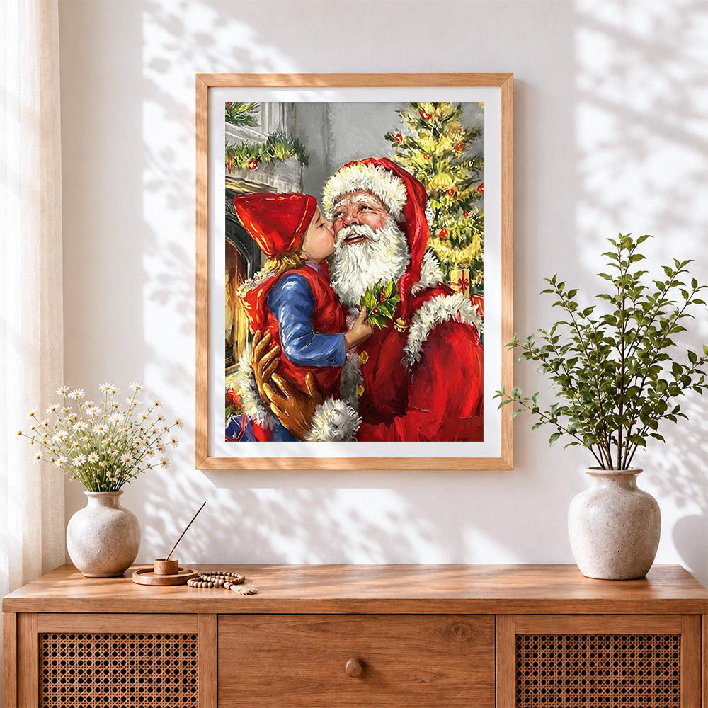 Finished heartwarming child kissing father christmas cross stitch artwork displayed