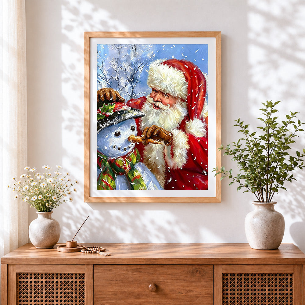 Finished heartwarming father christmas and snowman cross stitch artwork displayed