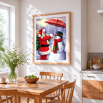 Heartwarming santa holding umbrella for a snowman cross stitch artwork displayed on wall as home decor