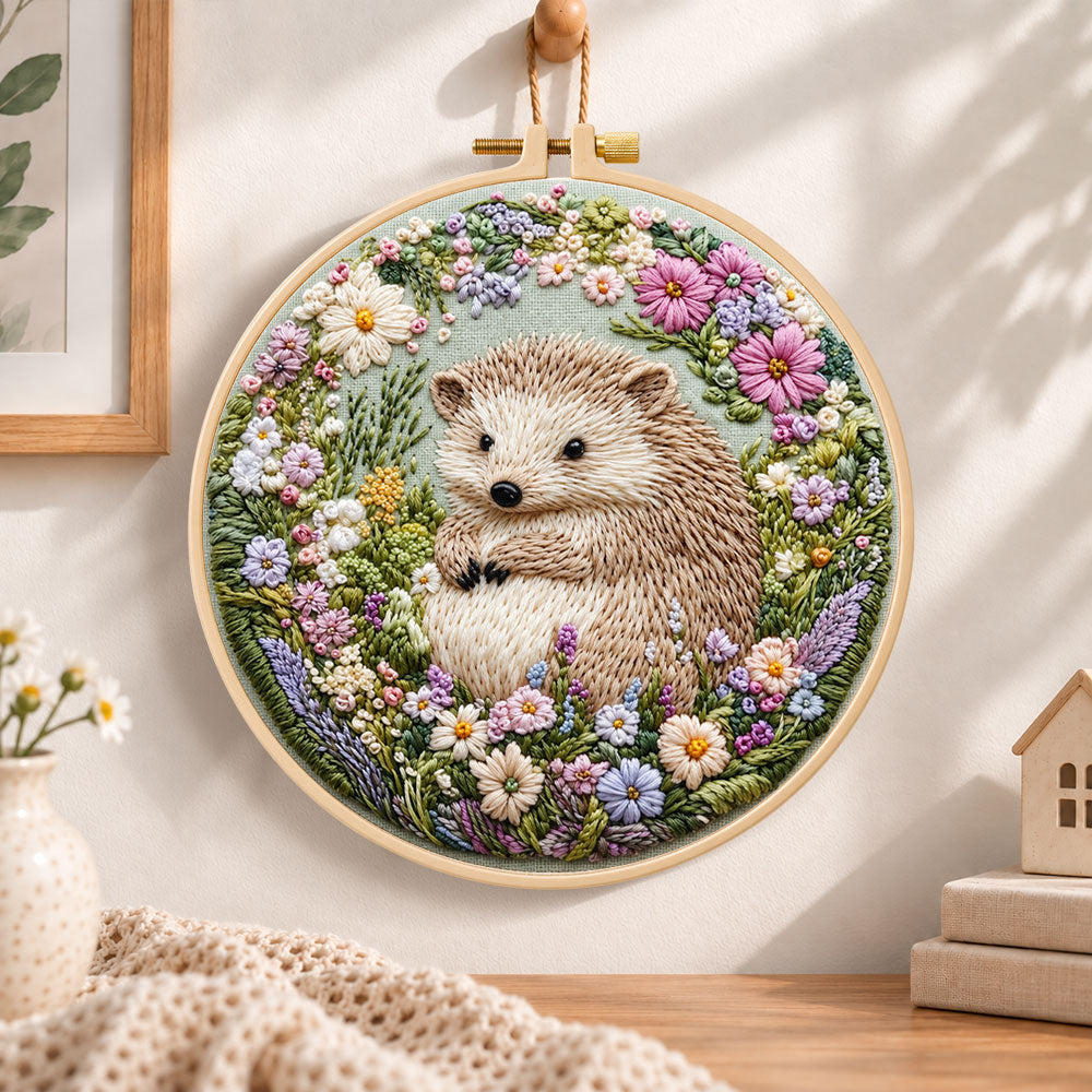 Hedgehog in wild blooms embroidery hoop wall art displayed as warm and cozy handmade home decor