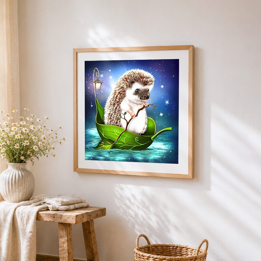Hedgehog sailing in a leaf boat cross stitch artwork displayed on wall as home decor