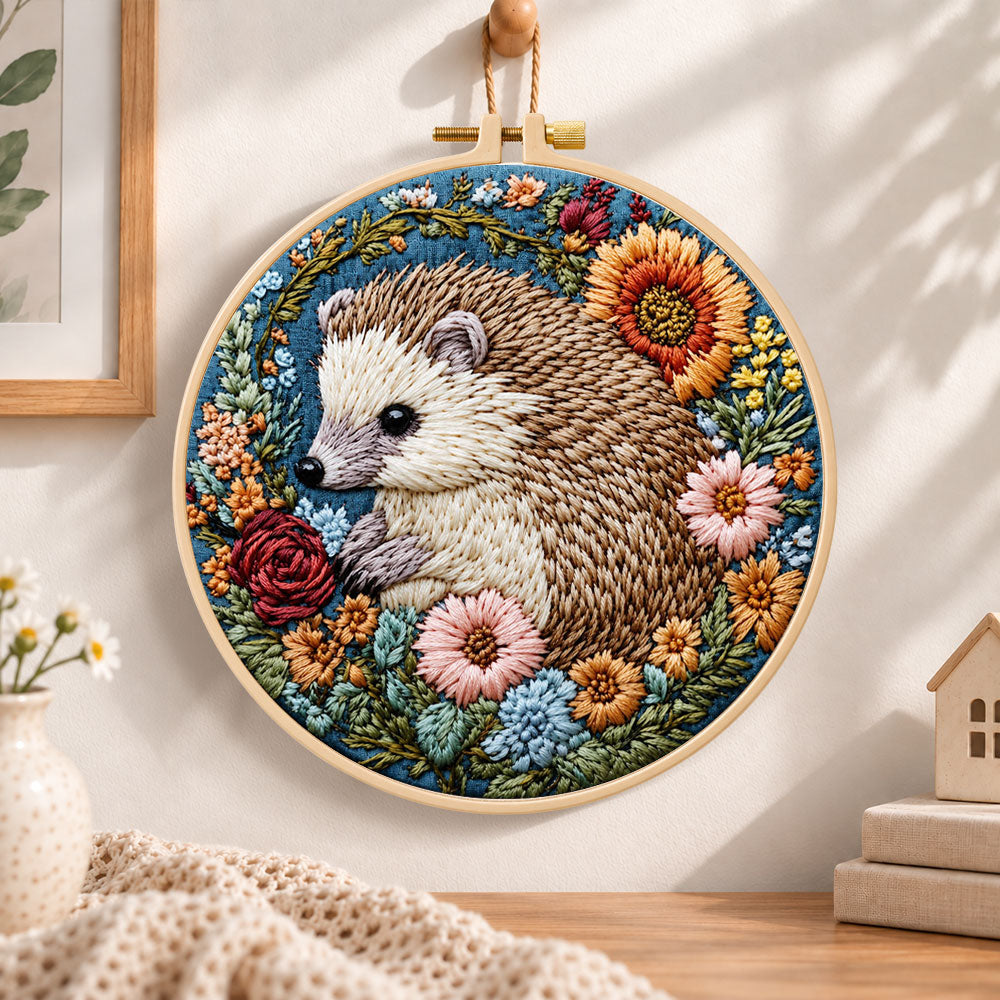 Hedgehog with sunflower blooms embroidery hoop wall art displayed as warm and cozy handmade home decor