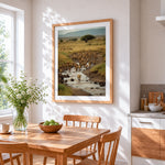 Herd of lions crossing a river cross stitch artwork displayed on wall as home decor